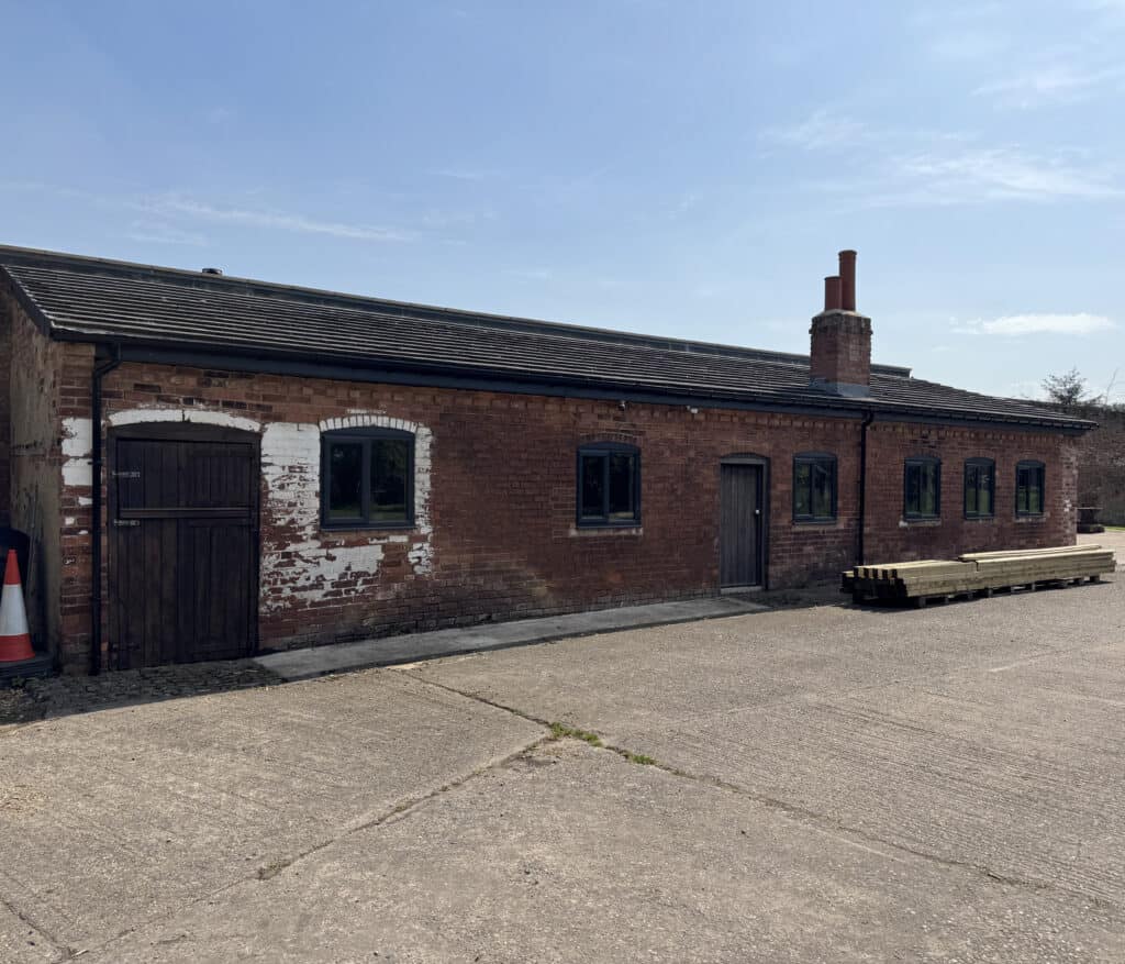 Planning permission granted to convert a traditional brick barn into a home near Bretby 2 Planning Design
