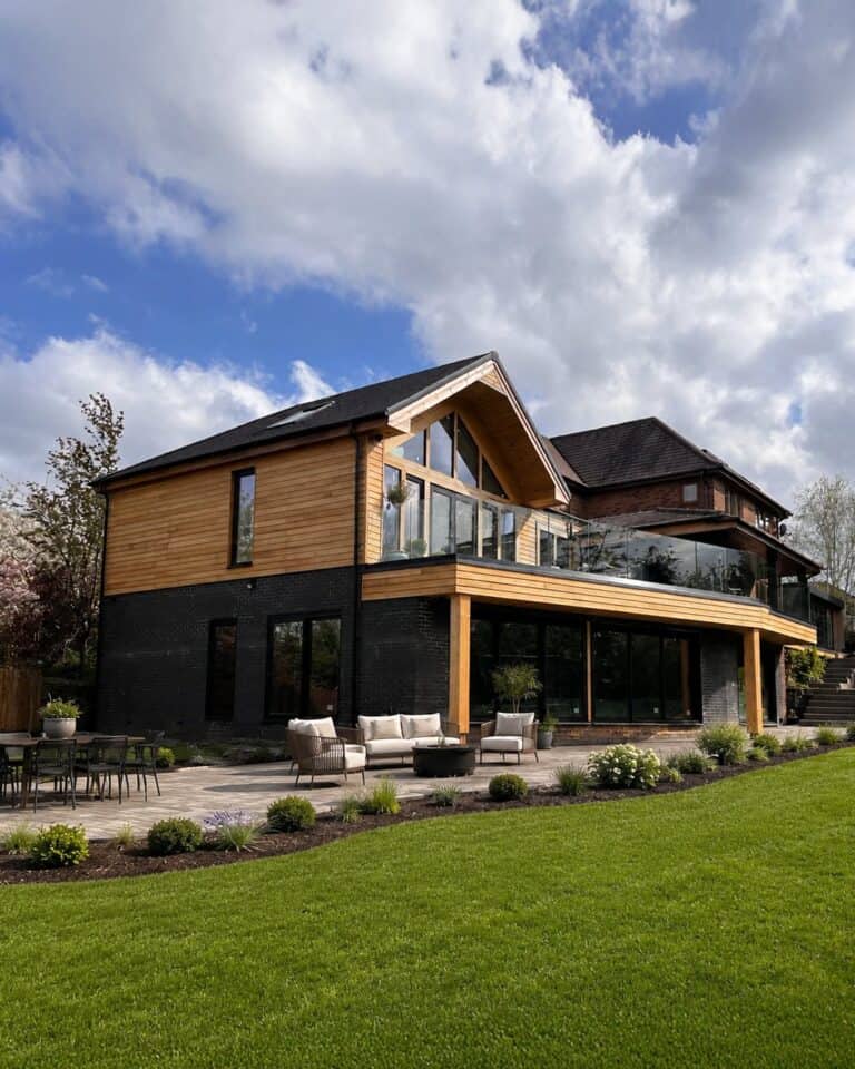 Contemporary timber and glass extension to a Derbyshire house, designed by Planning & Design Practice