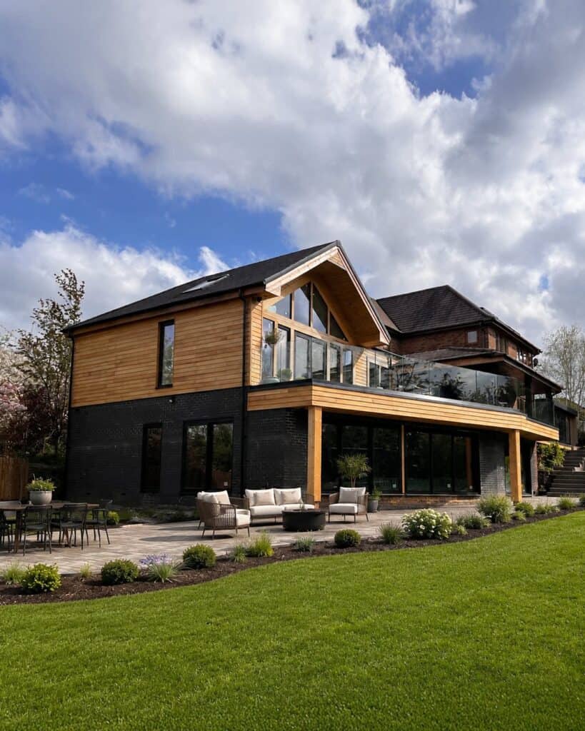 Contemporary timber and glass extension to a Derbyshire house, designed by Planning & Design Practice