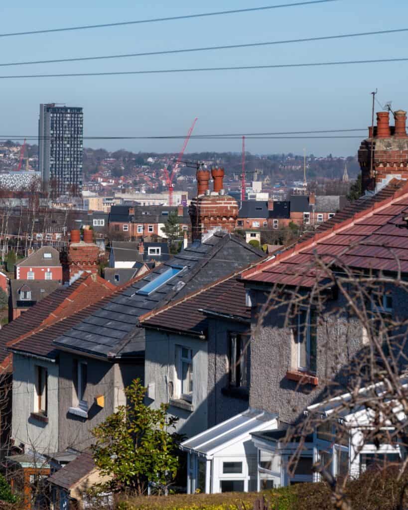 Rows of Sheffield houses with the city centre beyond