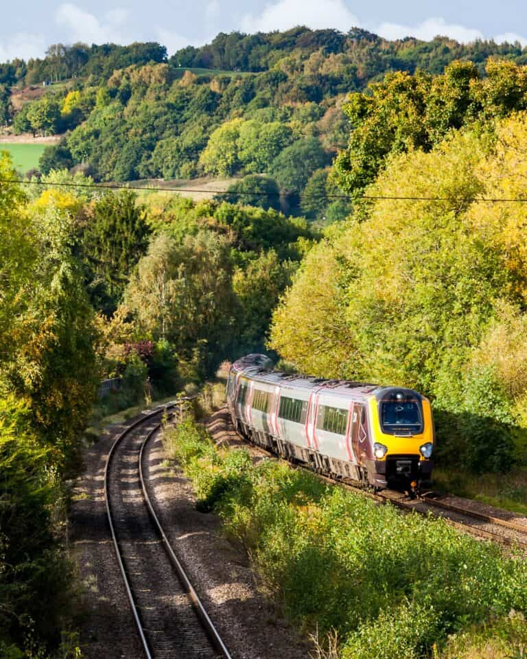 The wooded Derwent valley at Duffield in autumn, with the railway line curving through it