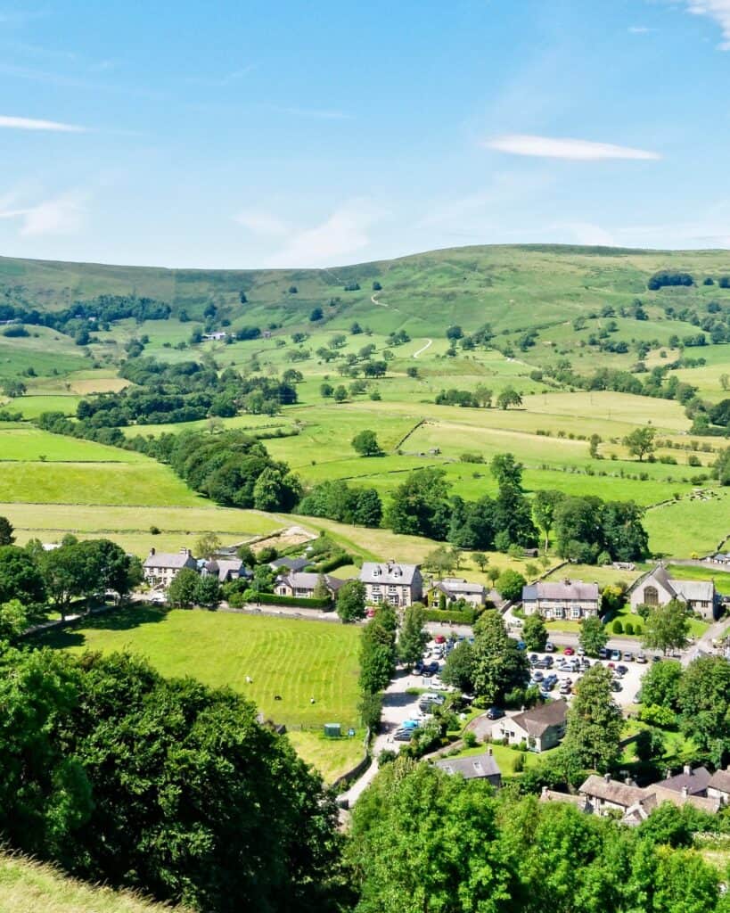 The village of Castleton in the Hope Valley with Mam Tor rising behind