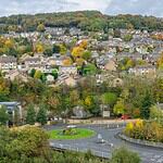 Elevated view across Matlock in autumn, the town set in its wooded valley