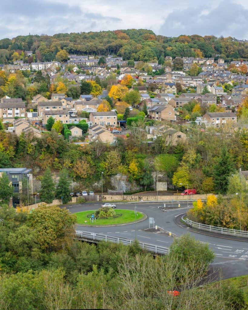 Elevated view across Matlock in autumn, the town set in its wooded valley