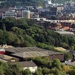 Sheffield seen from Parkwood Springs, industrial buildings below a wooded hillside