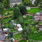 Aerial view of a suburban Sheffield street of houses with long back gardens